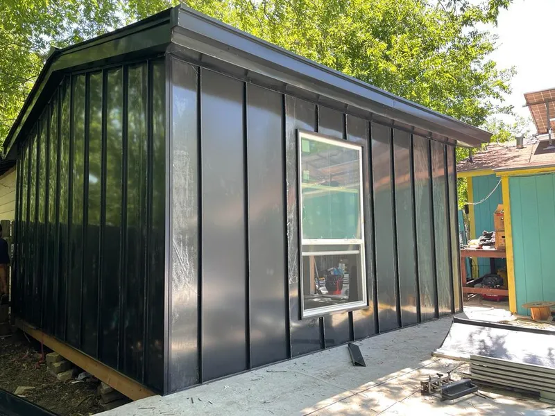 Black standing seam metal wall panels for Roof Inspection in Portsmouth